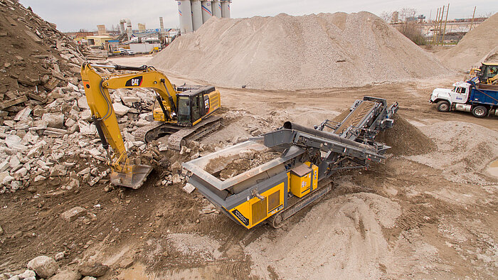 Concrete crusher producing a dense graded aggregate (DGA)